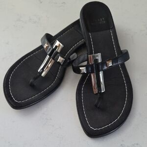 Stuart Weitzman Black Leather Thong Sandals with Silver Metallic Embellishments